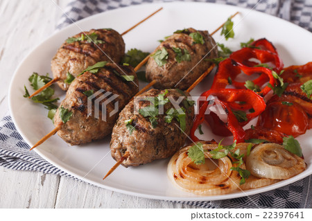 Kefte kebab with grilled vegetables on a plate 22397641