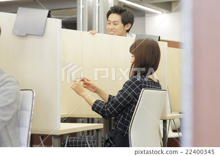 A businessman working in a share office A businessman working in a share office 22400345
