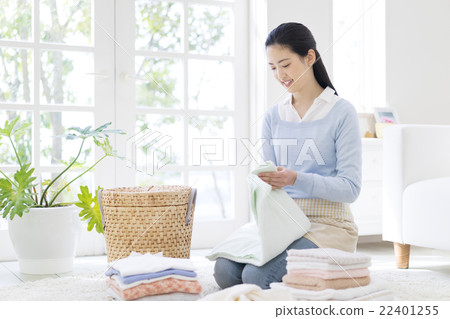 Japanese women folding laundry 22401255