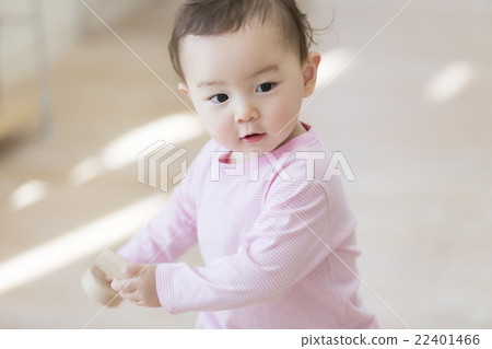 A boy with a block 22401466