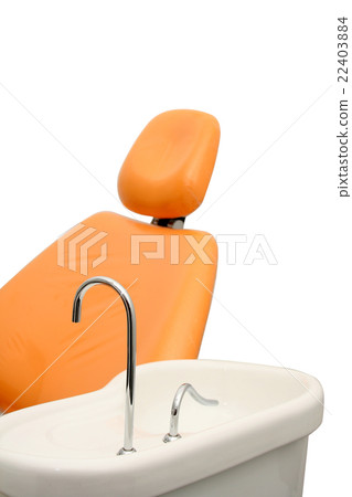 vertical side view photo of an orange dental chair vertical side view photo of an orange dental chair 22403884
