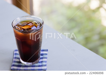 Ice coffee over a cool window Ice coffee over a cool window 22406898