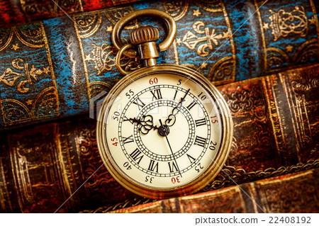 Old Books and Vintage pocket watch Old Books and Vintage pocket watch 22408192