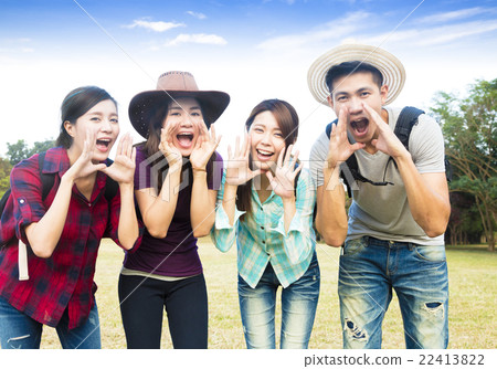 圖庫照片: happy young group with shouting gesture