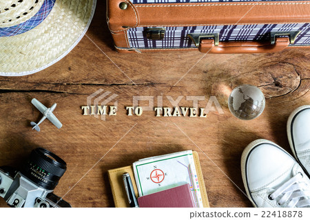 Outfit of traveler on wooden background Outfit of traveler on wooden background 22418878