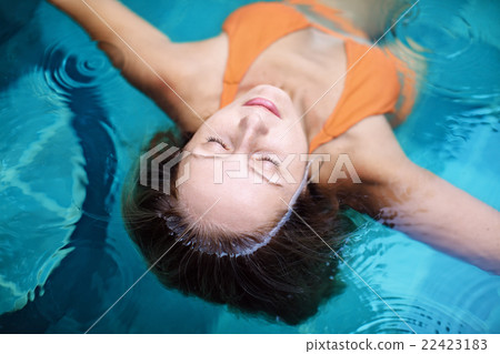 Beautiful woman relaxing in spa pool 22423183
