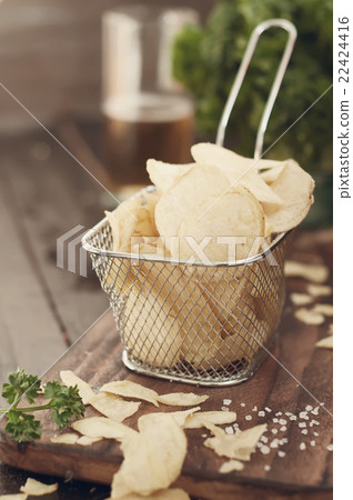 Crispy potato chips 22424416