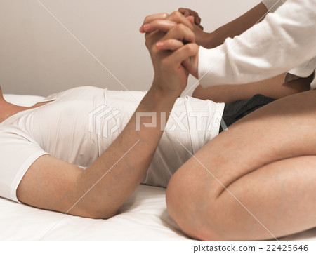 A couple flirting in bed 22425646
