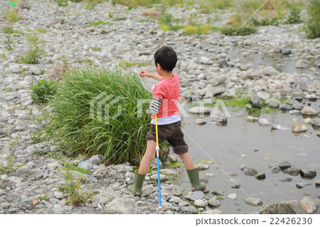 Boy playing in Kawahara 22426230