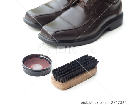 Dark brown shoe with shoe polish and brush shoe Dark brown shoe with shoe polish and brush shoe 22428241