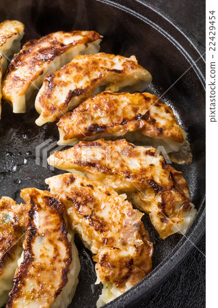 Grilled dumplings Delicious pot sticker Chinese food Grilled dumplings Delicious pot sticker Chinese food 22429454