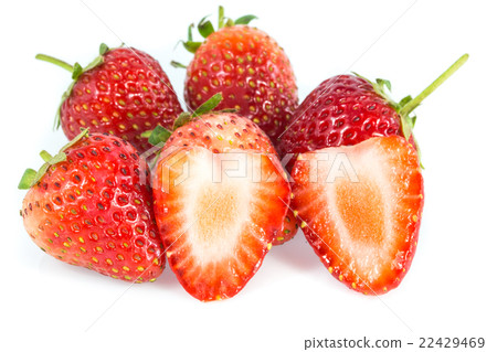 Strawberries and cut strawberry on white  22429469