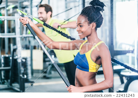 Woman and man in functional training for fitness Woman and man in functional training for fitness 22431243