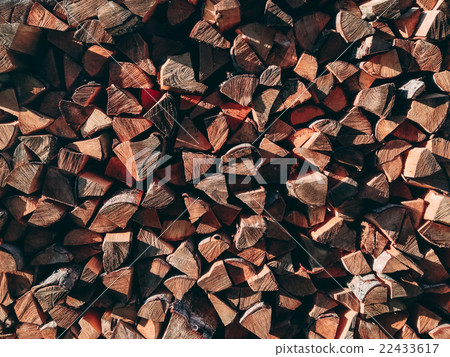 Photo of dry chopped firewood logs in a pile. Photo of dry chopped firewood logs in a pile. 22433617