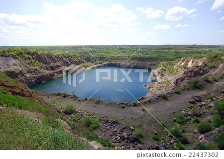 Blue lake in open pit 22437302