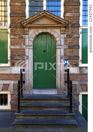 Traditional green front door with steps, Amsterdam Traditional green front door with steps, Amsterdam 22437441