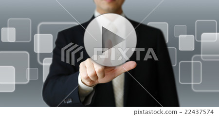 Businessman pushing play button Businessman pushing play button 22437574