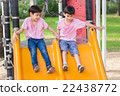 Two little asian boy play slider at playground 22438772