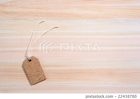 Tag label placed on a cypress table Price tag Background material Contrast intensified 22438780