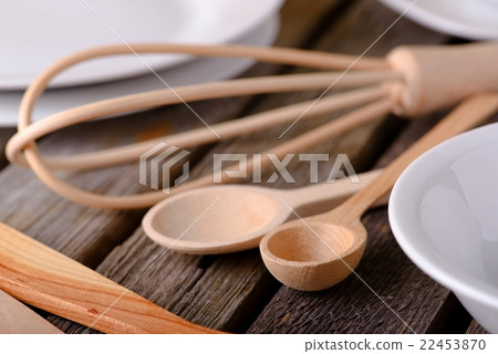 Couple of wooden spoons on a table 22453870