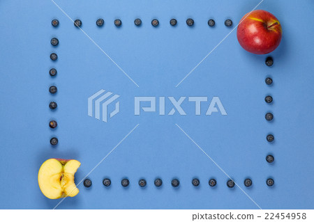 Apple with frame of blueberries 22454958