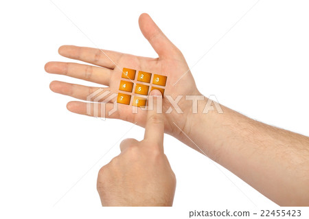 Hand with virtual phone buttons 22455423