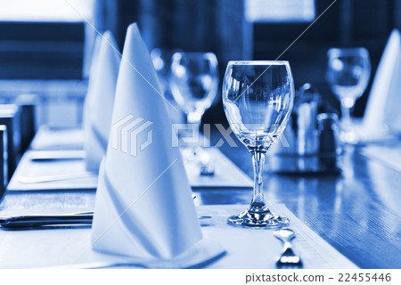Glasses and plates on table in restaurant Glasses and plates on table in restaurant 22455446