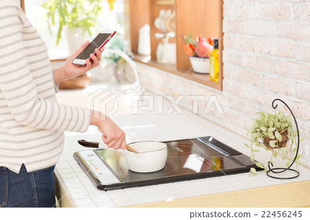 Woman cooking in the kitchen 22456245