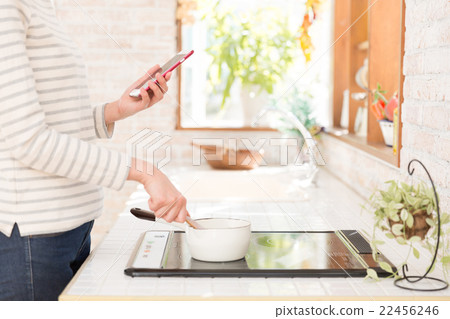 Woman cooking in the kitchen 22456246