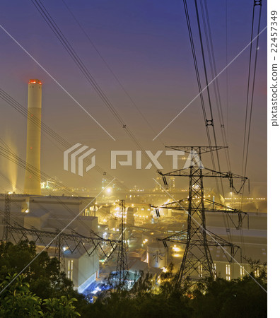 power station at night with smoke 22457349