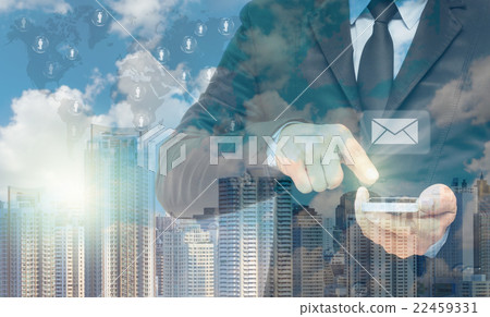 Double exposure of businessman using the tablet for sending the email on world map and cityscape background, business concept,Elements of this image furnished by NASA 22459331
