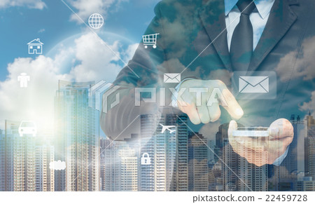 Double exposure of businessman using the smart phone on cityscape background, business concept 22459728