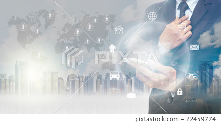 Double exposure of businessman using the tablet for Information technology on world map and cityscape background, business concept,Elements of this image furnished by NASA Double exposure of businessman using the tablet for Information technology on world map and cityscape background, business concept,Elements of this image furnished by NASA 22459774