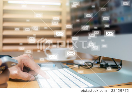 Many e-mail over the finger pressing the computer keyboard blurred background, business technology concept Many e-mail over the finger pressing the computer keyboard blurred background, business technology concept 22459775