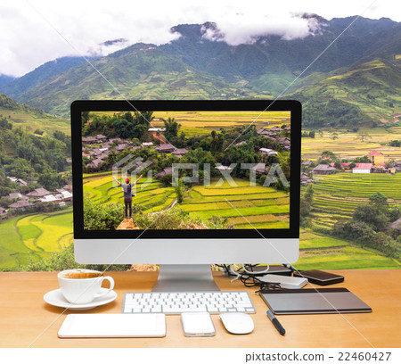 Conceptual image of a workspace with computer desktop on Traveler at Rice fields on terraced of Tu le District, YenBai province, Northwest Vietnam Conceptual image of a workspace with computer desktop on Traveler at Rice fields on terraced of Tu le District, YenBai province, Northwest Vietnam 22460427
