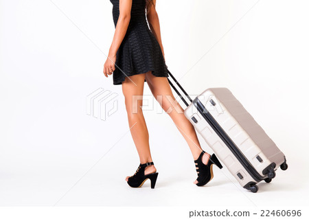 Attractive tourist woman with suitcase on isolated Attractive tourist woman with suitcase on isolated 22460696