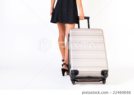 Attractive tourist woman with suitcase on isolated Attractive tourist woman with suitcase on isolated 22460698