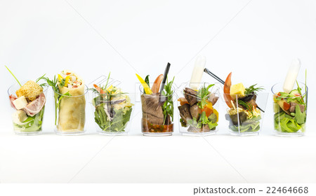 Mini Canape with meat and vegetables in plastic cu 22464668