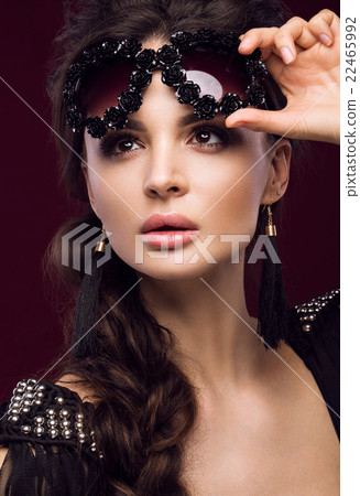 Beautiful girl in dark sunglasses, with curls and Beautiful girl in dark sunglasses, with curls and 22465992