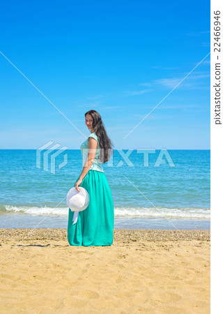 Brunette with long hair on the Mediterranean sea Brunette with long hair on the Mediterranean sea 22466946