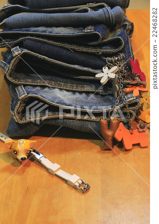 Jeans trousers on the  table ,trousers Jeans  22468282