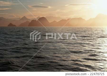 Alaskan white nights. Sunset over the alaskan coas Alaskan white nights. Sunset over the alaskan coas 22470725