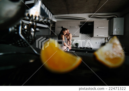 man and woman in the kitchen man and woman in the kitchen 22471322