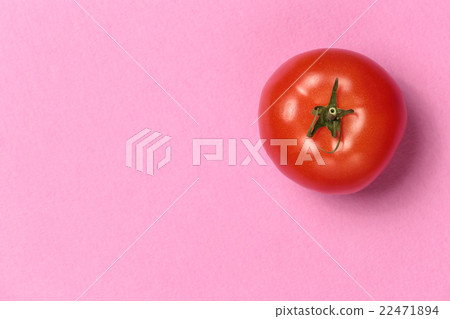 Top view of  ripe juicy tomato on a pink 22471894