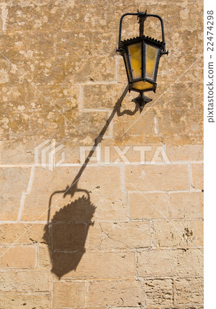 Old lantern and its shadow Old lantern and its shadow 22474298