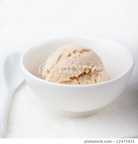 Ice cream with Earl grey tea flavor in white bowl Ice cream with Earl grey tea flavor in white bowl 22475931