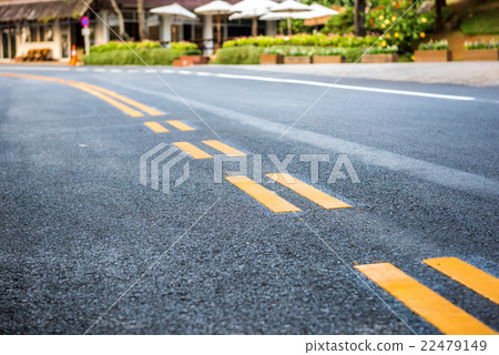 Asphalt road, yellow line on the new road 22479149