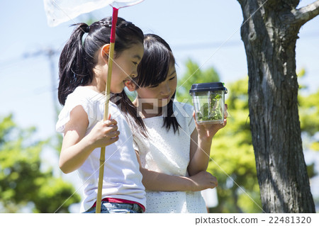 Elementary school students playing outdoors 22481320