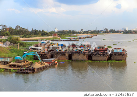 Backhoe load sand in Big barge 22485657