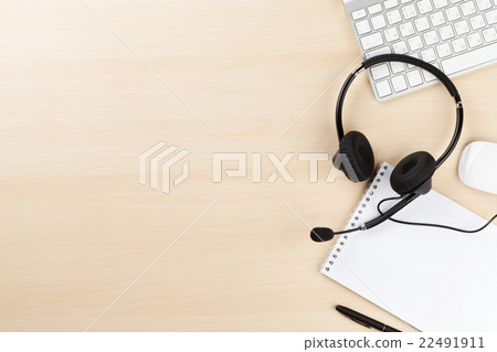 Office desk with headset and pc 22491911